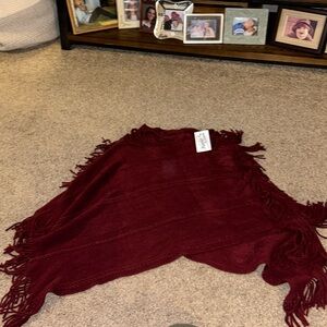 Burgundy sweater style tasseled knit poncho from Gatlinburg Tennessee. NWT